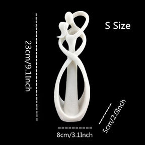 Escultura Abstrata de Casal Beijando em Resina